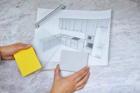 Soft focus On the table is a mock-up of a kitchen, an example of a palette of Stock-Fotos