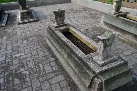 Soft focus A typical tomb grave in Java. Family funeral in Java, Indonesia Stock Photos