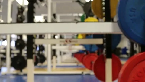 Soft Focus on Weightlifting Racks and Weights Stock Footage 69229252