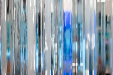 Soft-focused abstract background of vertical metallic strips Stock Photos