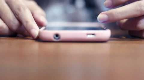 Soft focused girl's hands browsing smartphone Stock Footage 61190045