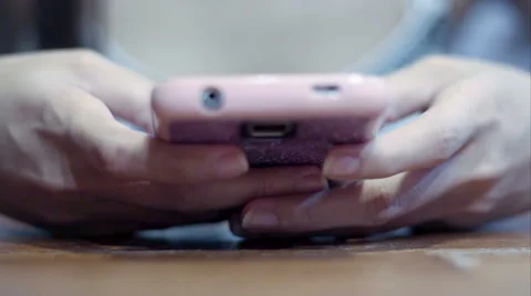 Soft focused girl's hands browsing smartphone Stock Footage 61191023