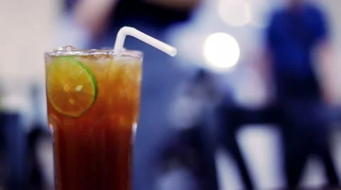 Soft focused Iced tea with lime slice and restaurant background Stock Footage 66693133