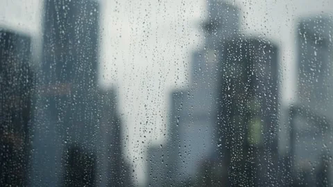 Soft Focused Raindusted Window Portrays Introspective Urban Atmosphere And Stock Footage 323777696