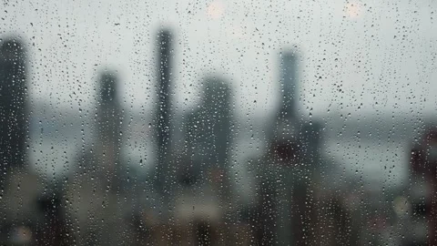 Soft Focused Raindusted Window Portrays Introspective Urban Atmosphere And Stock Footage 323778422