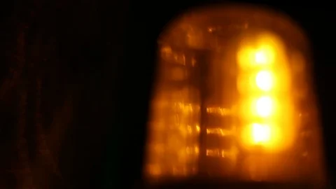 Soft focused spinning amber flasher, Warning hazard sign Stock Footage 92181422