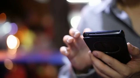 Soft focused young man using smartphone Video stock 85428560