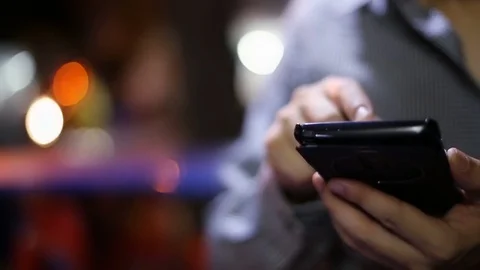 Soft focused young man using smartphone Stock Footage 85428892