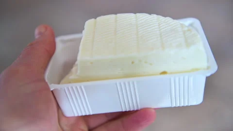 Soft fresh table cheese of Sardinia, Italian appetizer in Italy closeup Stock Footage 287888293