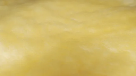 Soft furry yellow surface close up stock footage Stock Footage 98336352