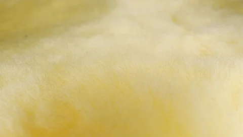 Soft furry yellow surface close up stock footage Stock Footage 98336850