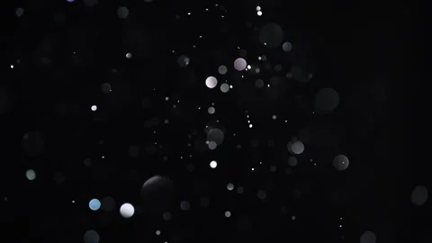 Soft glitter particles for elegant visuals. 動画素材 322799725