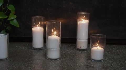 Soft Glowing Candles Set Tranquil Mood, Illuminated Candles Forge Relaxing And Stock Footage 323780325