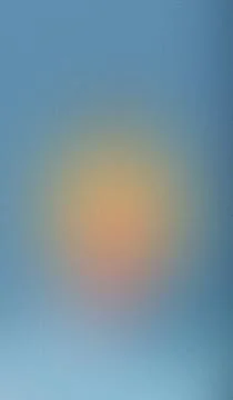 Soft glowing orb floats in a hazy blue sky. Warm light radiates gently from.. イラスト素材