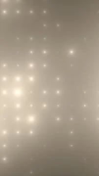 Soft glowing white lights forming gentle dotted grid pattern on warm beige ba Illustrazione stock