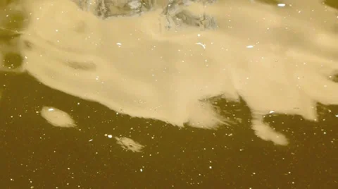 Soft gold lazy reflections in calm water Video stock 38347903