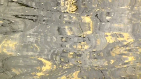 Soft gold lazy reflections in calm water Stock Footage 38503628