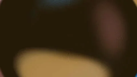 Soft golden light illuminating human shoulder with gentle skin texture and warm Stock Footage 333501060