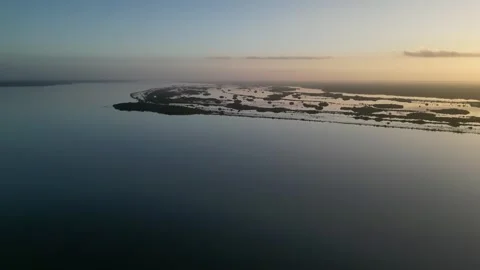 Soft Golden Light Over Seaside Hotel and Coast Bacalar Vídeos de archivo 322548215