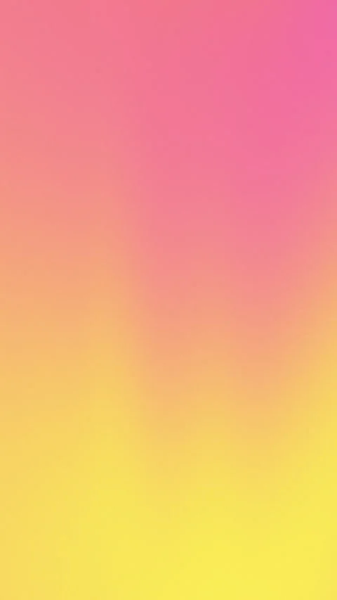 Soft gradient blends pink to yellow 库存影片 333843782