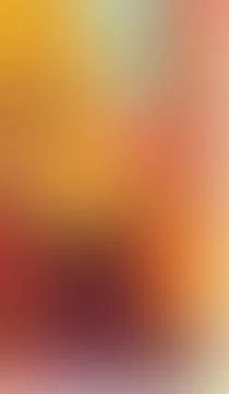 Soft gradient blends warm hues. Orange, red, and gold swirl gently. Texture.. Stock Illustration