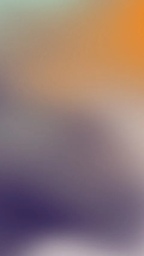 Soft gradient blends warm orange to cool purple tones Video stock 336874190