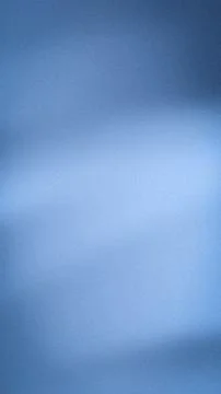 Soft gradient blue background with grainy texture vertical design abstract .. 스톡 사진