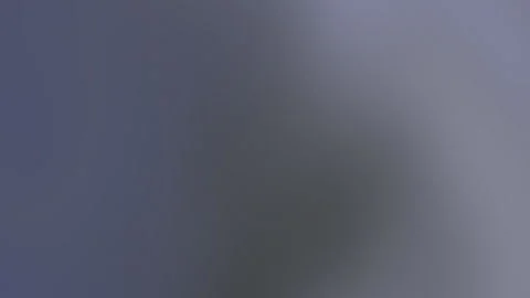 Soft gradient sky transitions from deep blue to pale gray Stock-Footage 333524900