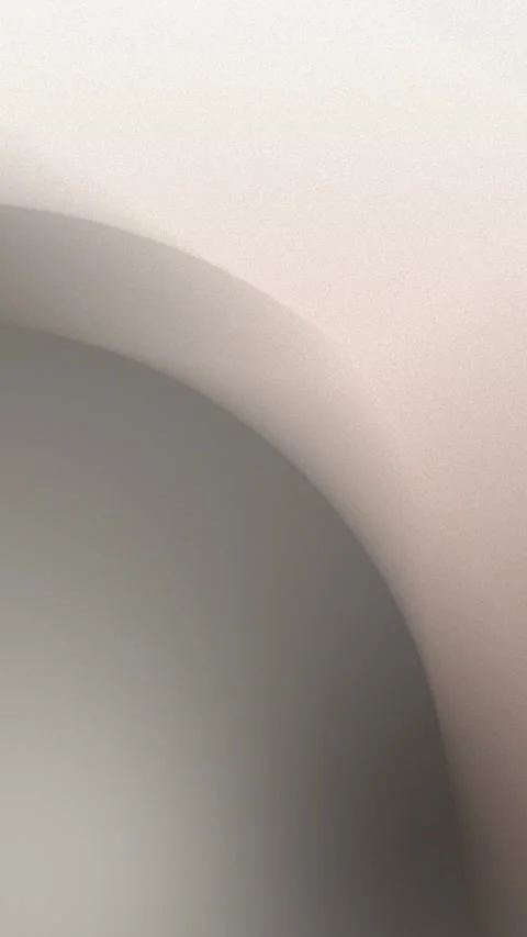 Soft gradient with smooth beige and gray curves. Seamless loop background. 4K. Vidéo 309956587