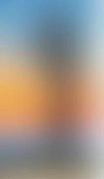 Soft gradient transitions blend blue to warm orange hues. Texture hints at .. Stock Illustration