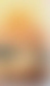 Soft gradient transitions blend warm hues into muted tones. Texture appears.. Stock Illustration