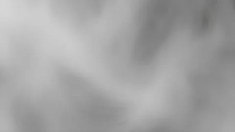 Soft gray abstract background with smooth blurry smoke or cloud texture for.. Fotos de archivo