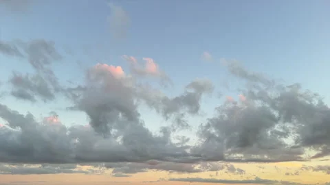 Soft Gray and Pink Clouds in Blue Evening Sky. Time Lapse Vídeo Stock 347790885
