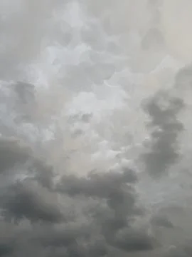 Soft Gray Clouds Across Overcast Sky Stock Photos
