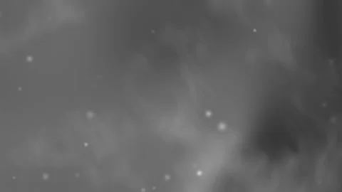 Soft gray smoky clouds drift slowly across the frame 库存影片 332613283