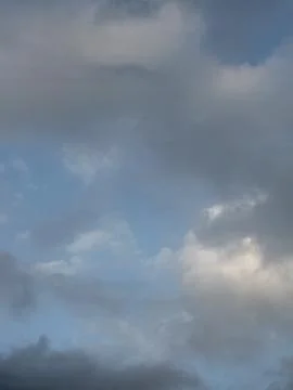 Soft Gray Storm Clouds With Blue Sky 写真素材