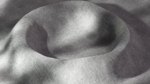 Soft gray textile surface dynamically transforming into concave shape, casting Stock Footage 303966935