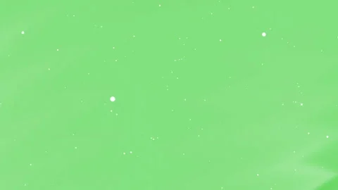 Soft green backdrop with gentle white speckles floating Stock Footage 330035991
