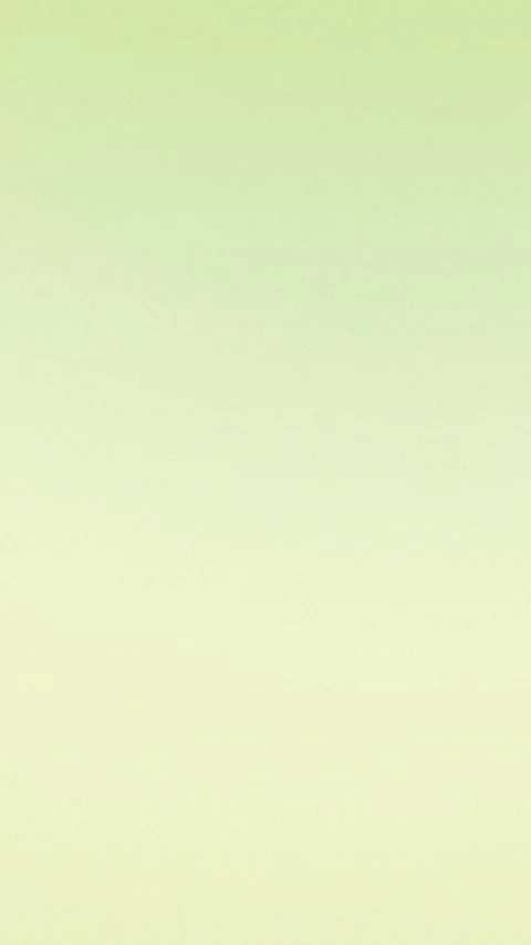 Soft green gradient background with subtle texture. Seamless loop. 4K. Stockbeeldmateriaal 309956641