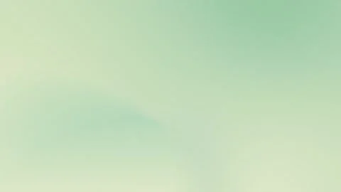 Soft green gradient with smooth transitions and subtle textures creates a Stockbeeldmateriaal 309058762
