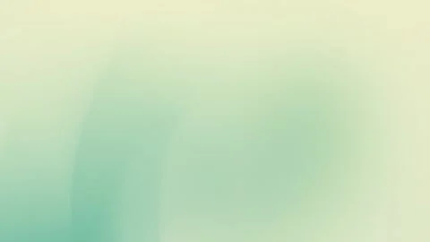 Soft green gradient with subtle yellow blends in a seamless loop background. 4K Stock Footage 309700842