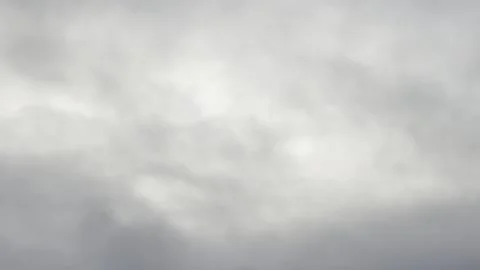 Soft Grey Overcast Clouds Filling a Moody Sky Stockbeeldmateriaal 339378371
