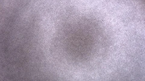 Soft grey surface with smooth texture shows subtle variations in tone. Gentle Stock Photos