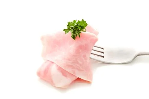 Soft ham slice wrapped on fork Stock Photos