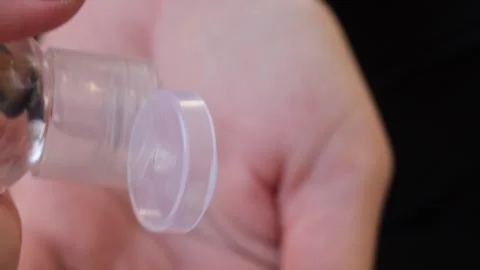 Soft hand applying sanitizer liquid, clean action symbolizes awareness and .. Stock Footage 320736340