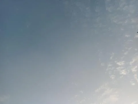 Soft Haze with Scattered Clouds Stock Photos