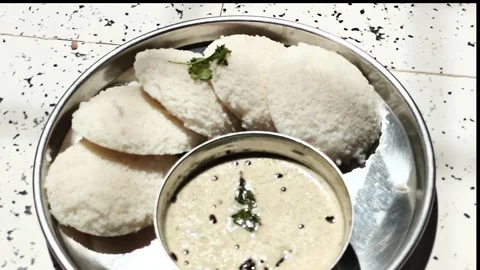 Soft Homemade Idli with Coconut Chutney, Authentic South Indian Breakfast Cl Stock Footage 338355997