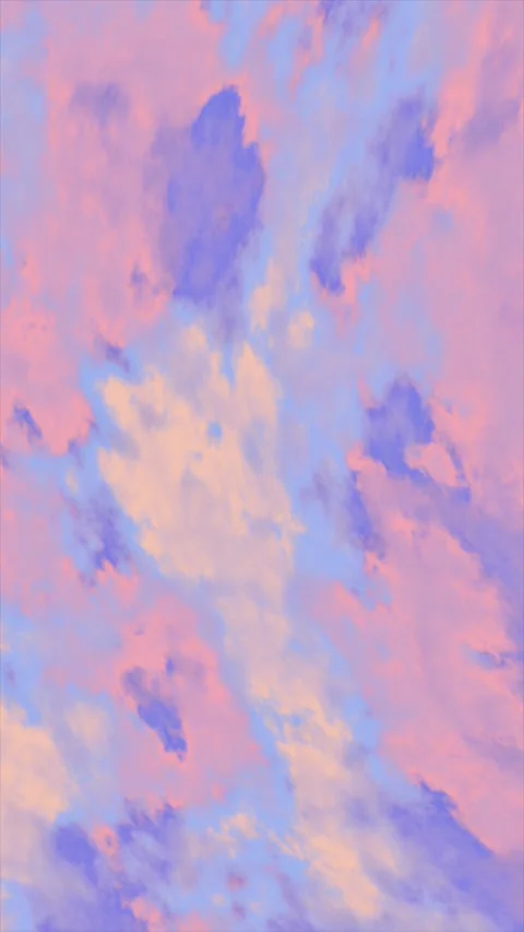 Soft hues blend together as clouds drift across the sky at sunset Stock Footage 311983721
