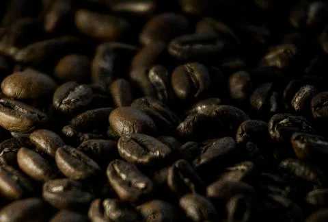 Soft image of roasted brown coffee beans. Stock Photos