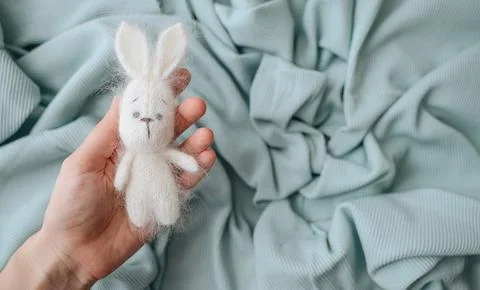 A soft knitted toy with space for text, perfect for themes of childhood Stock Photos